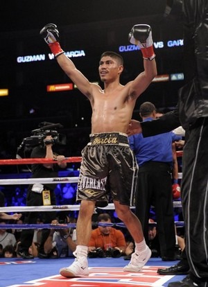 Mikey Garcia vs. Juan Manuel Lopez: Garcia Dominates in Big Win