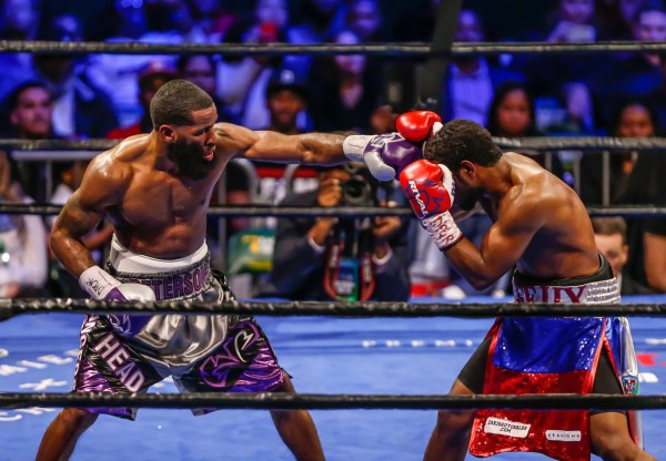Peterson Scores Controversial Decision, Colon DQ’d and Rushed to Hospital