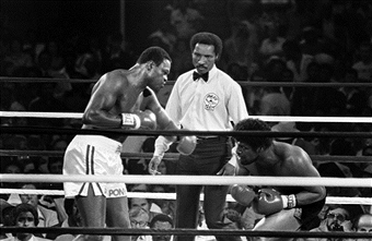 larry-holmes-leon-spinks-getty-images