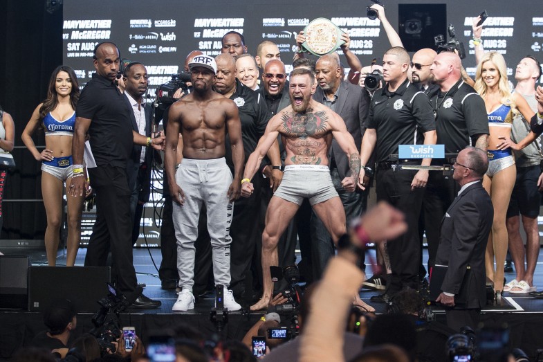 Floyd Mayweather vs. Conor McGregor Weigh-In Results & Photos